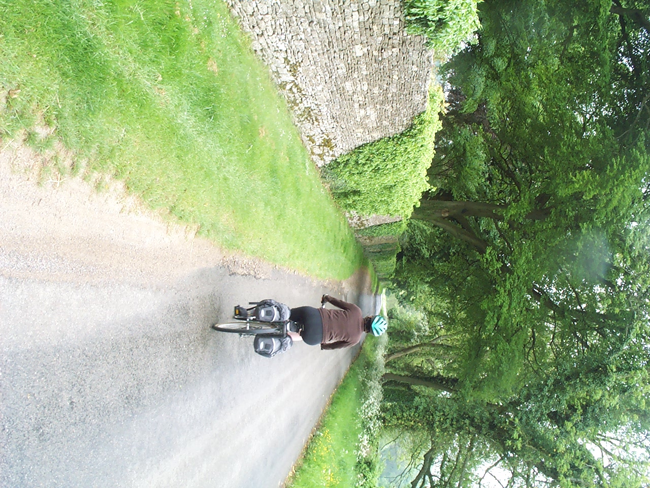 Cycling through the beautiful village of Swinbrook